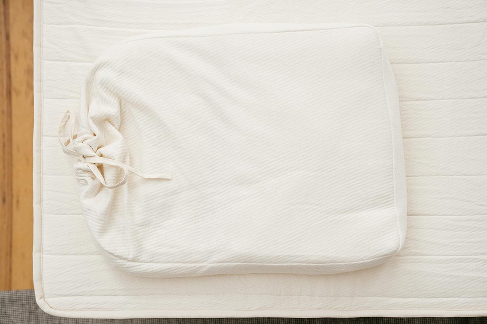 Peace Lily Mattress Protector with the bag